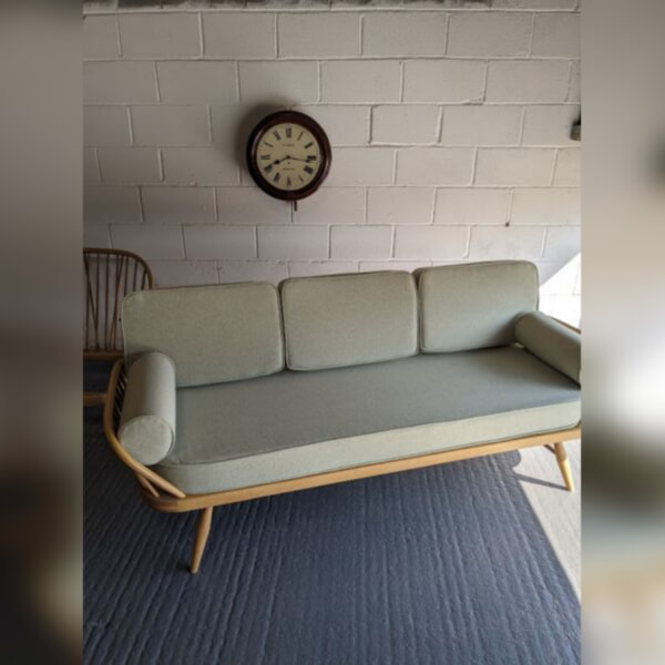Ercol Daybed with bolsters in Cristina Marrone Lemon Grass